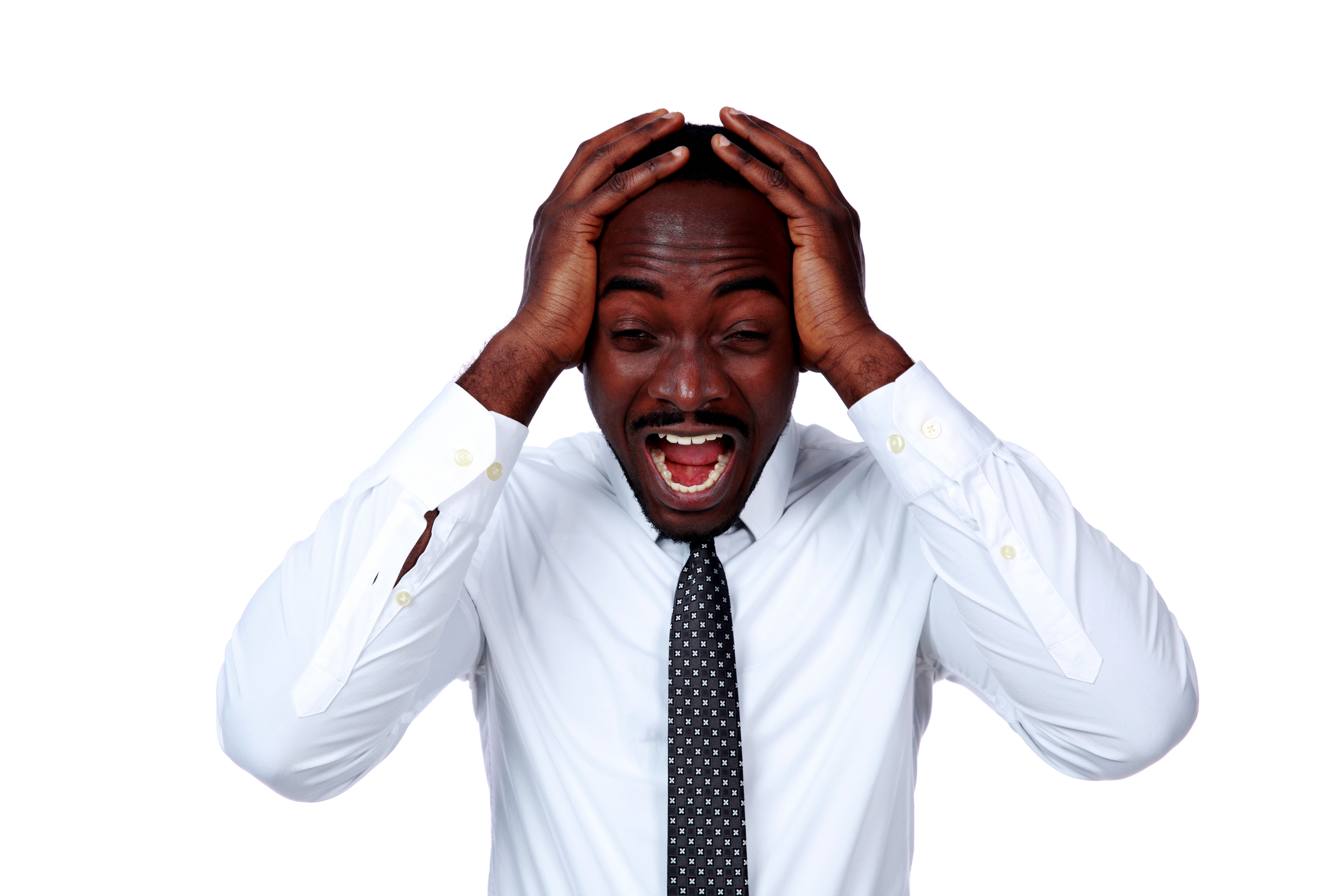 Portrait of a crazy african businessman shouting and closing ear by his hands on white background